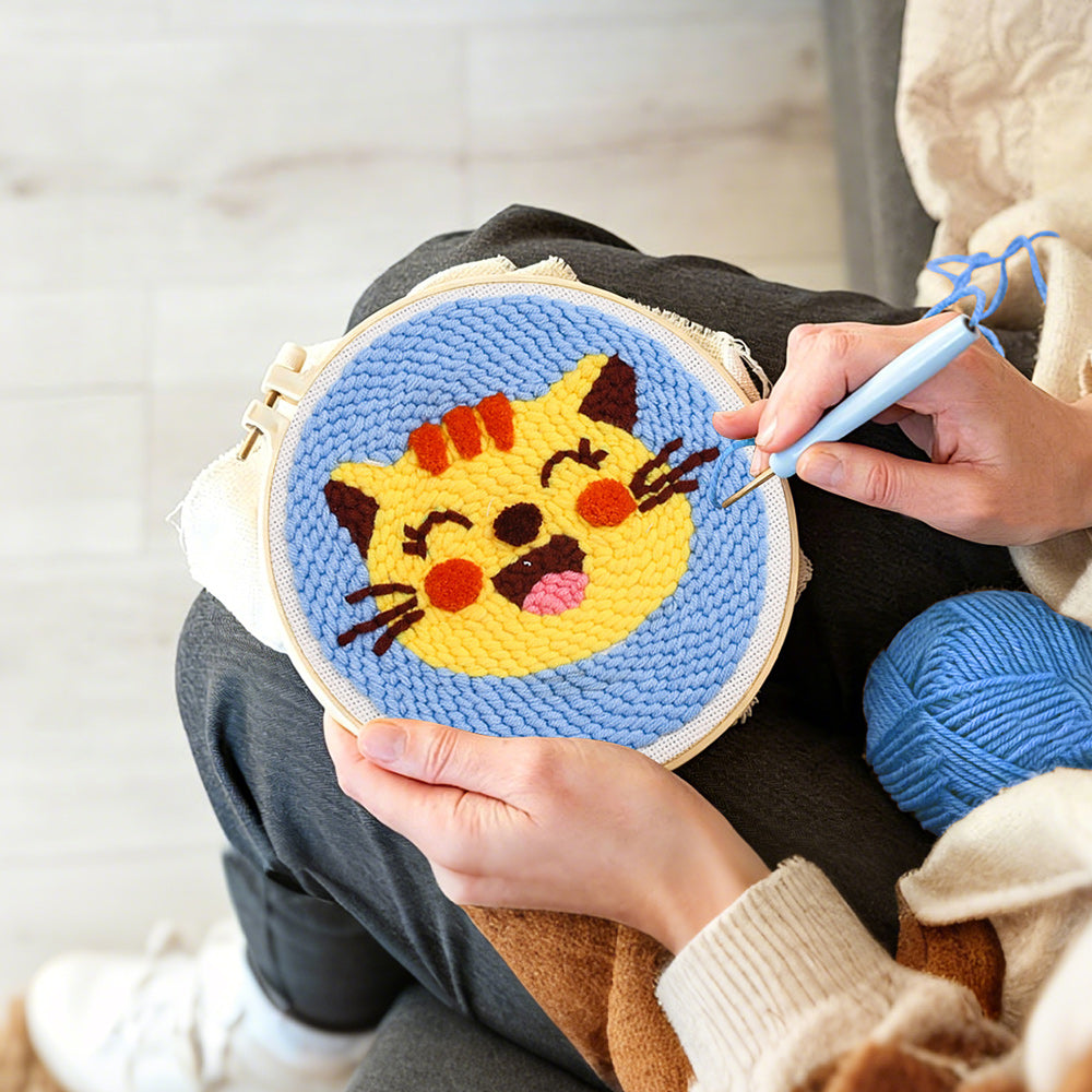 Creating handmade super happy cat punch needle artwork