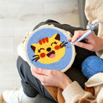 Creating handmade super happy cat punch needle artwork