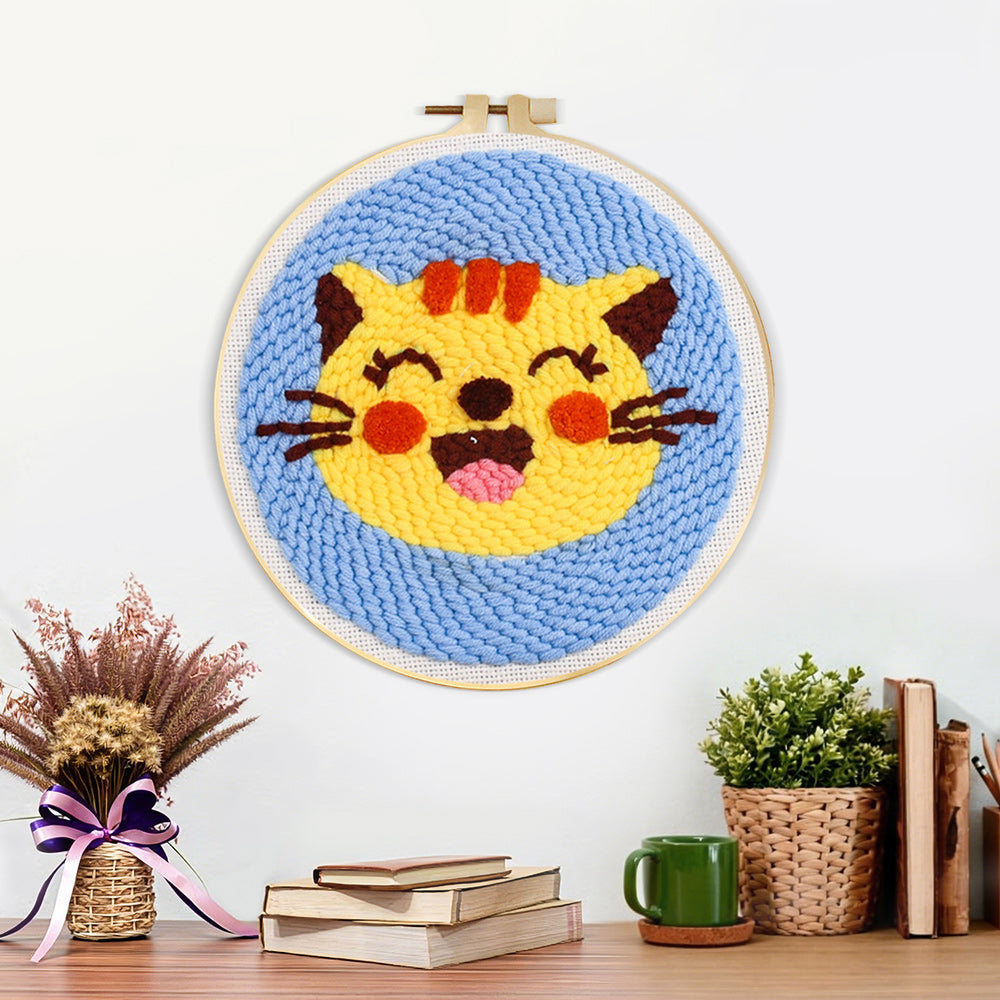 Finished super happy cat artwork displayed on a wall