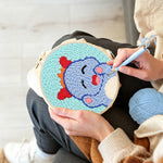 Creating handmade sweet baby dinosaur punch needle artwork