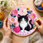 Creating the sweet black and white cat with flowers wool painting by hand with a felting needle