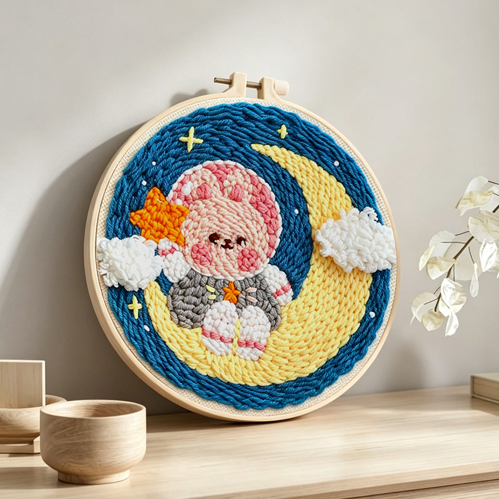 Sweet bunny on the moon punch needle artwork displayed on a table