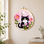 Sweet cat with pink flowers needle felt wall art displayed in a bright home interior