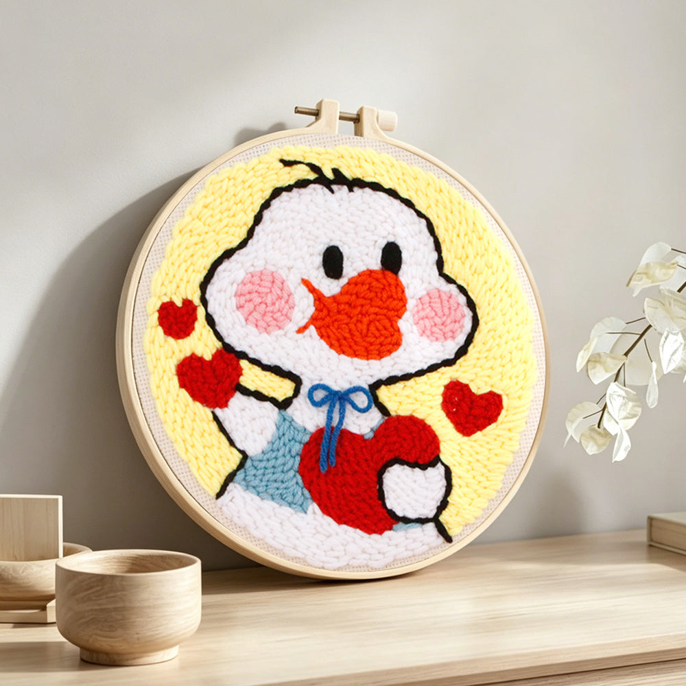Sweet duck in love punch needle artwork displayed on a table