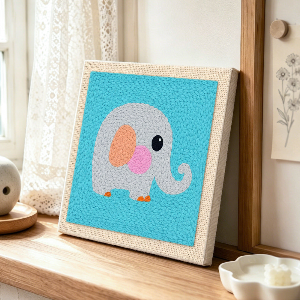 Sweet grey elephant punch needle artwork displayed on a table