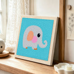 Sweet grey elephant punch needle artwork displayed on a table