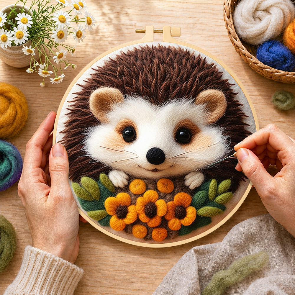 Creating the sweet little hedgehog with floral accents wool painting by hand with a felting needle