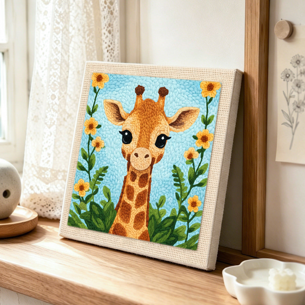 Sweet long-neck giraffe and flowers punch needle artwork displayed on a table
