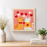 Finished sweet nose-to-nose cat couple artwork displayed on a wall