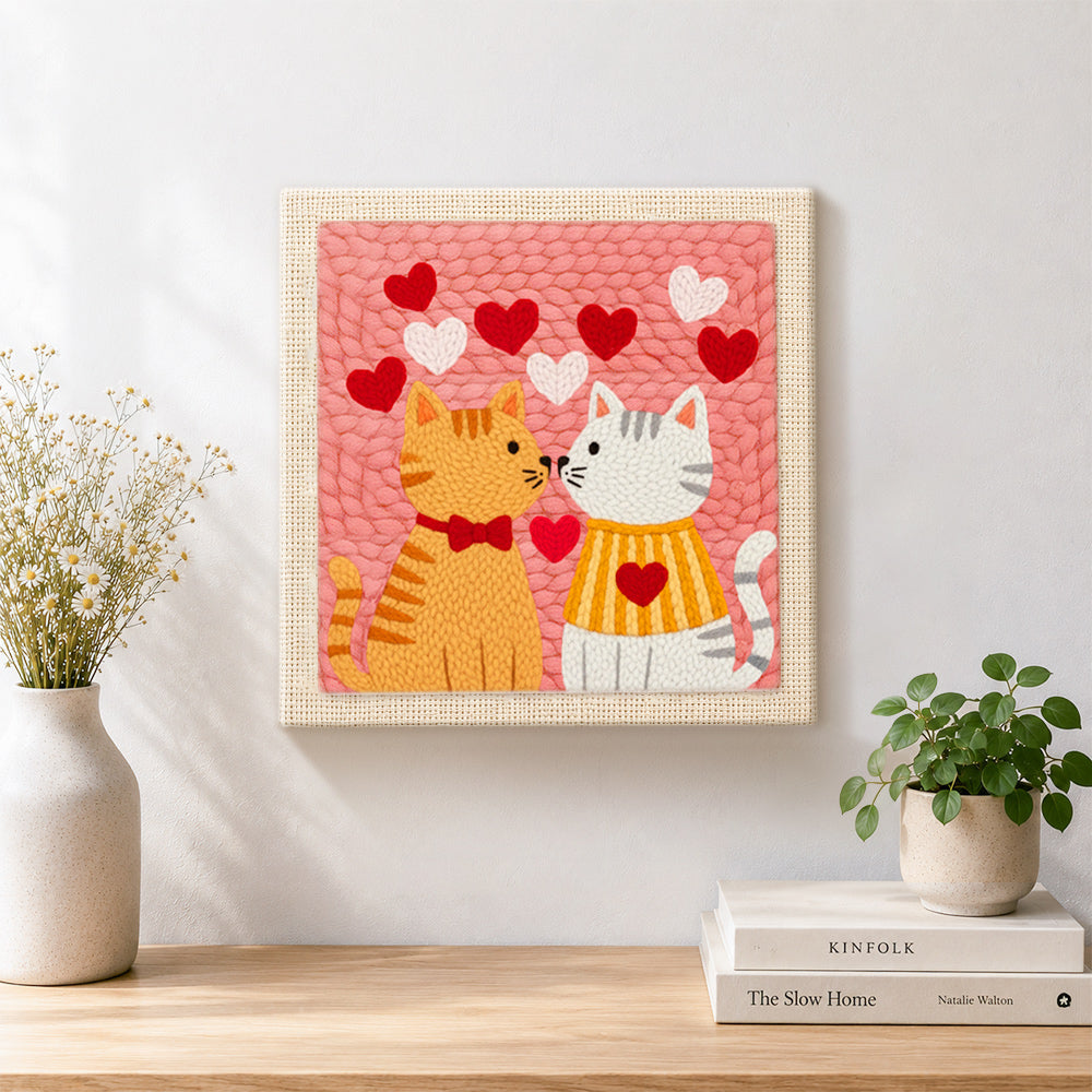 Finished sweet nose-to-nose cat couple artwork displayed on a wall