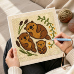 Creating handmade sweet otter family punch needle artwork