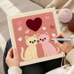 Creating handmade Sweet pink and cream cat pair with large heart punch needle artwork