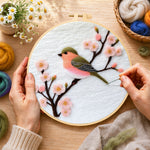 Creating the sweet pink blossom bird wool painting by hand with a felting needle