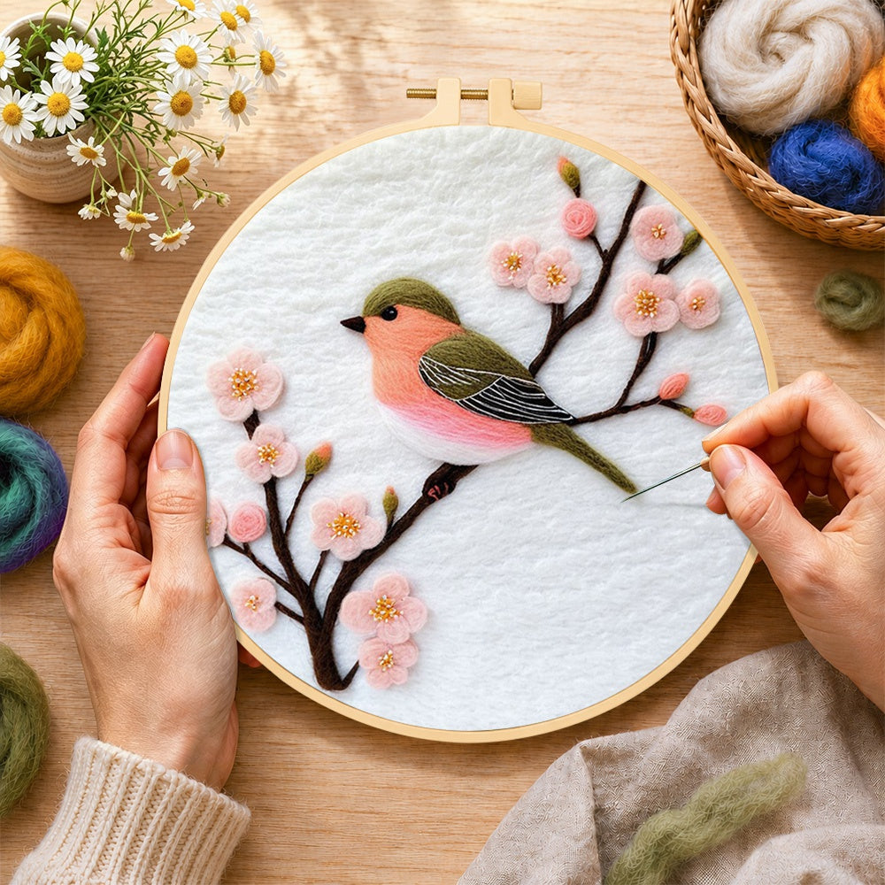 Creating the sweet pink blossom bird wool painting by hand with a felting needle