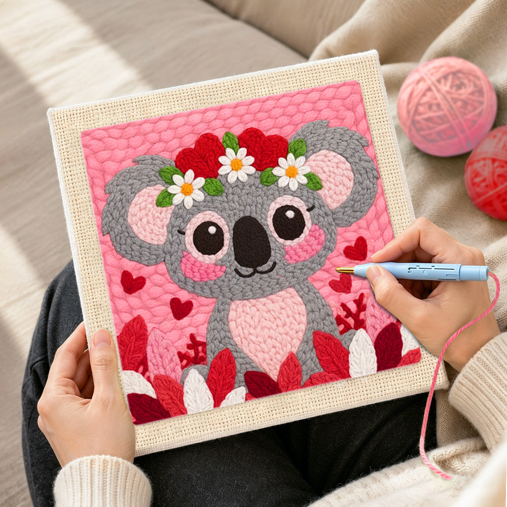 Creating handmade sweet pink koala with heart flower crown punch needle artwork