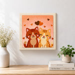 Finished sweet snuggling cat couple artwork displayed on a wall