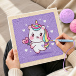Creating handmade sweet unicorn with magic heart wand punch needle artwork