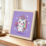 Sweet unicorn with magic heart wand punch needle artwork displayed on a table