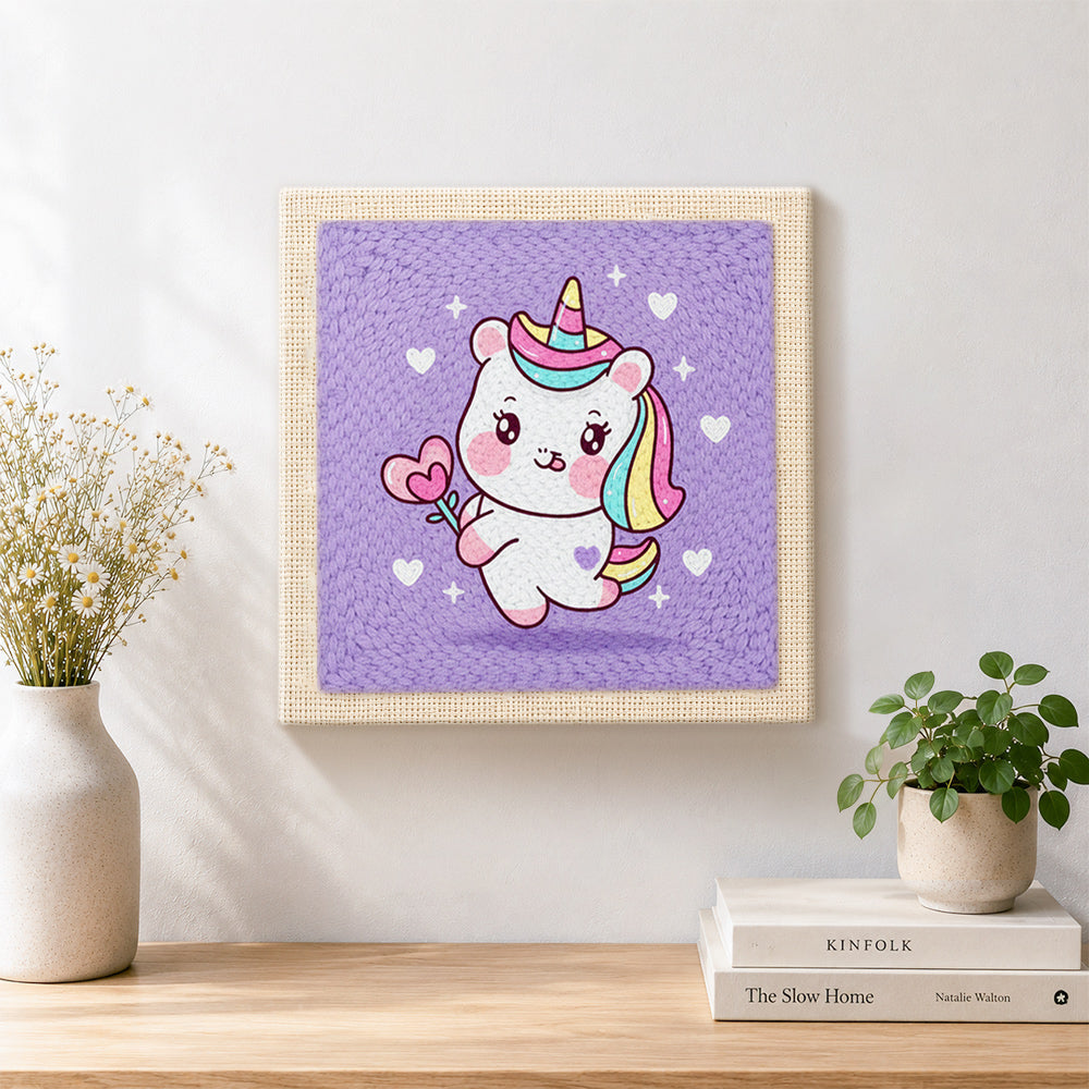 Finished sweet unicorn with magic heart wand artwork displayed on a wall