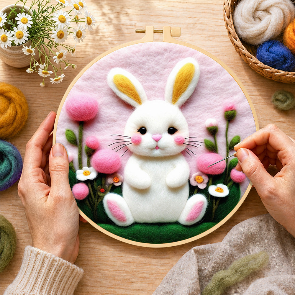 Creating the sweet white bunny and pink flowers wool painting by hand with a felting needle