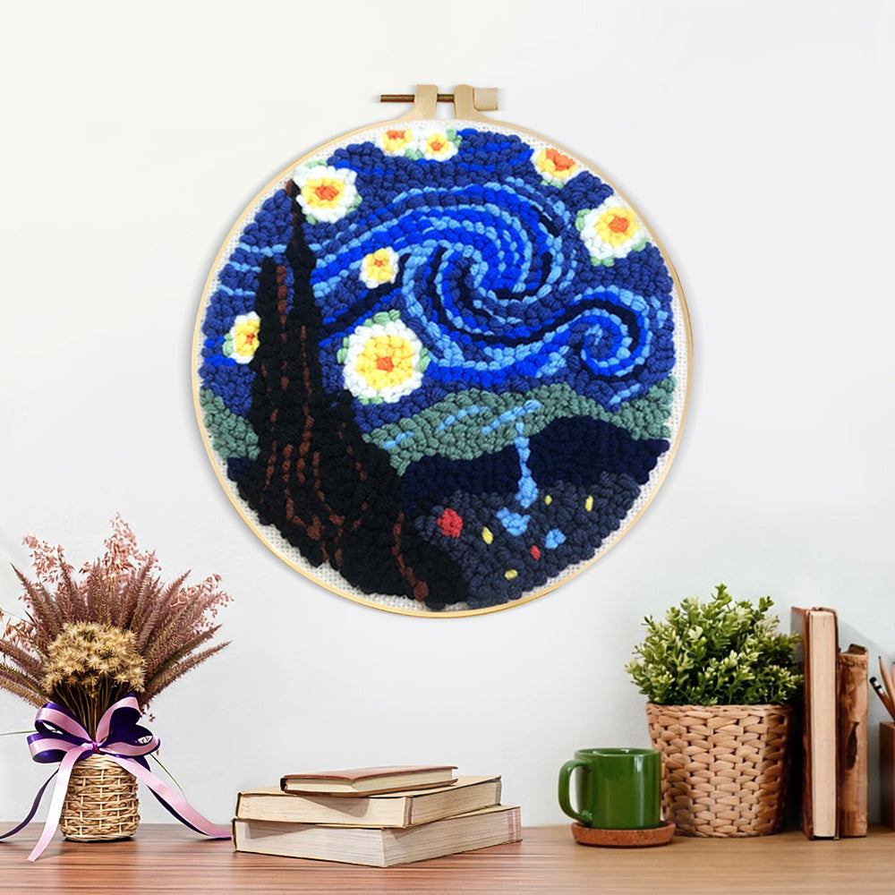 Finished swirling blue night sky with glowing stars artwork displayed on a wall