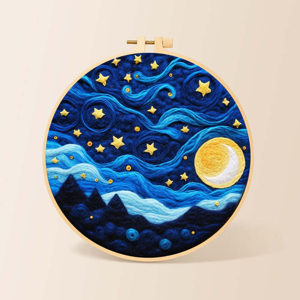 Swirling night sky with stars and blue clouds needle felting kit for beginners with a round wooden frame