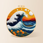 Swirling ocean and sunset needle felting kit for beginners with a round wooden frame