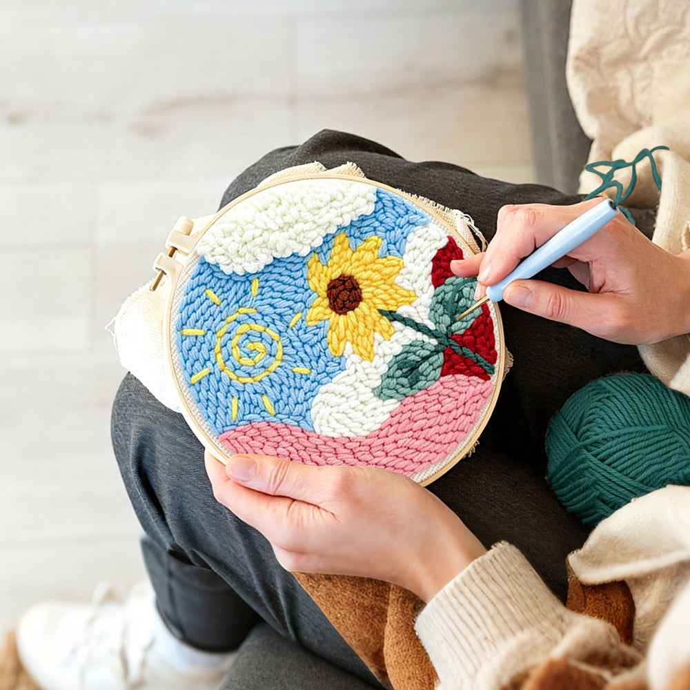 Creating handmade swirly sun and cheerful sunflower punch needle artwork