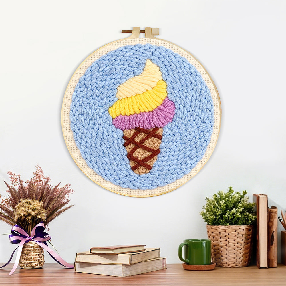 Finished swirly yellow and purple ice cream artwork displayed on a wall