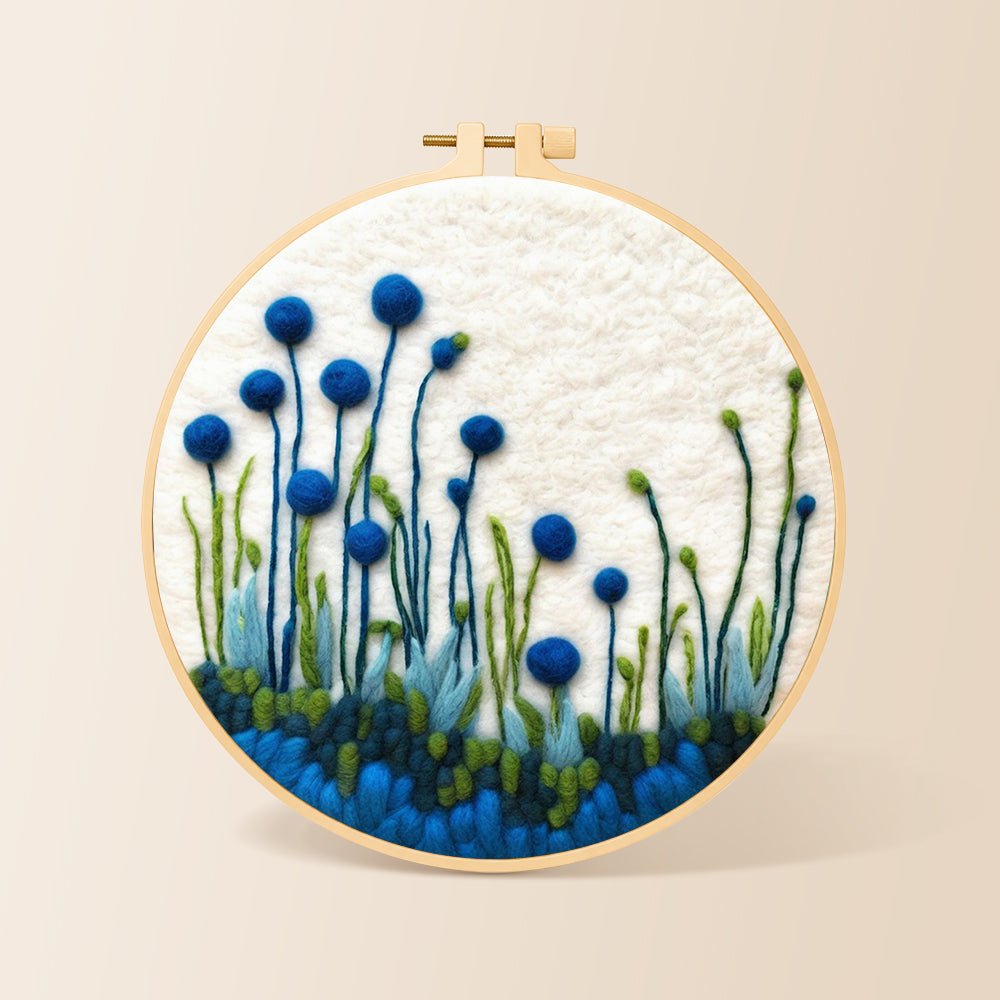Tall blue wildflowers on white needle felting kit for beginners with a round wooden frame