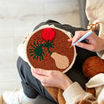 Creating handmade terracotta sunset botanical punch needle artwork