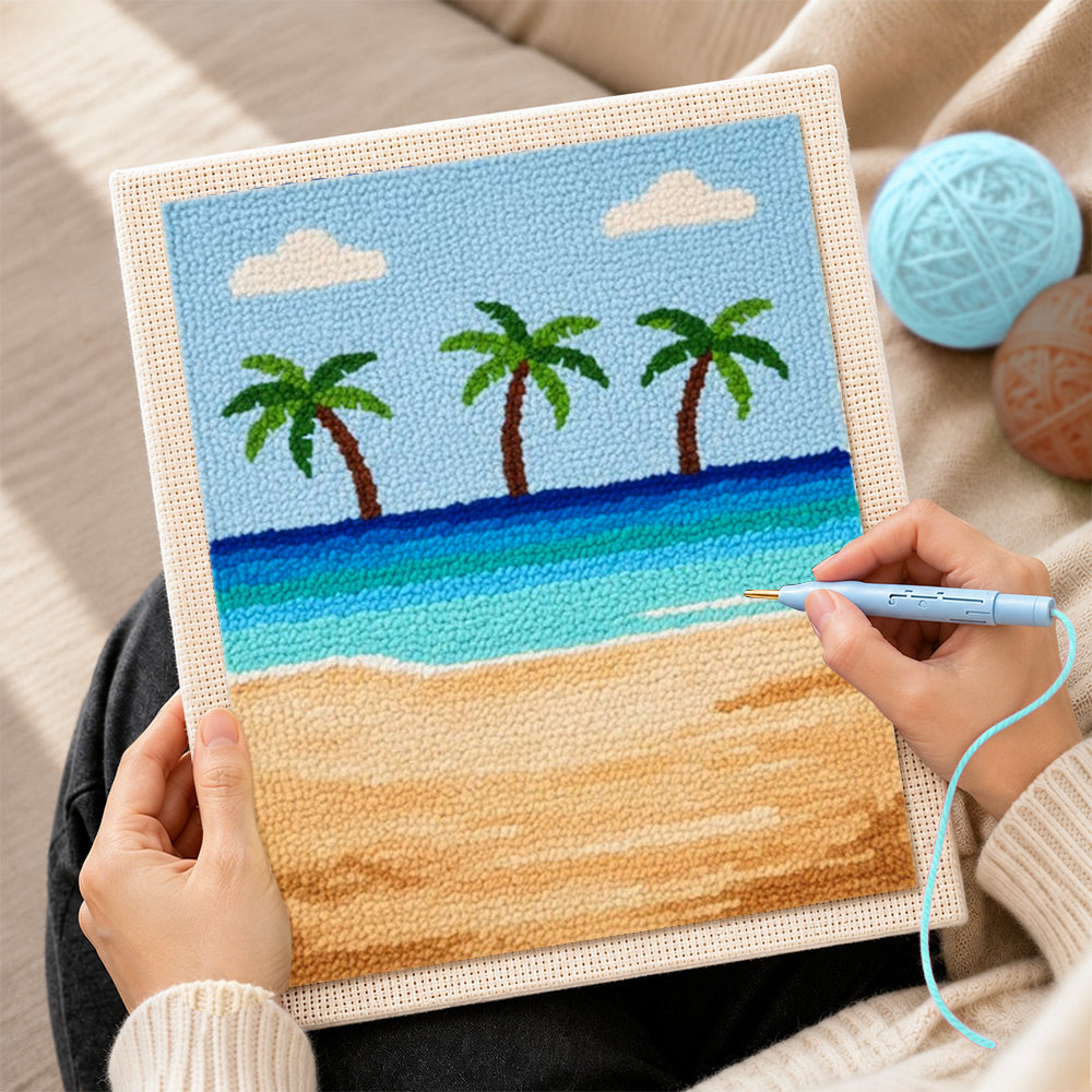 Creating handmade three palm trees and blue ocean punch needle artwork