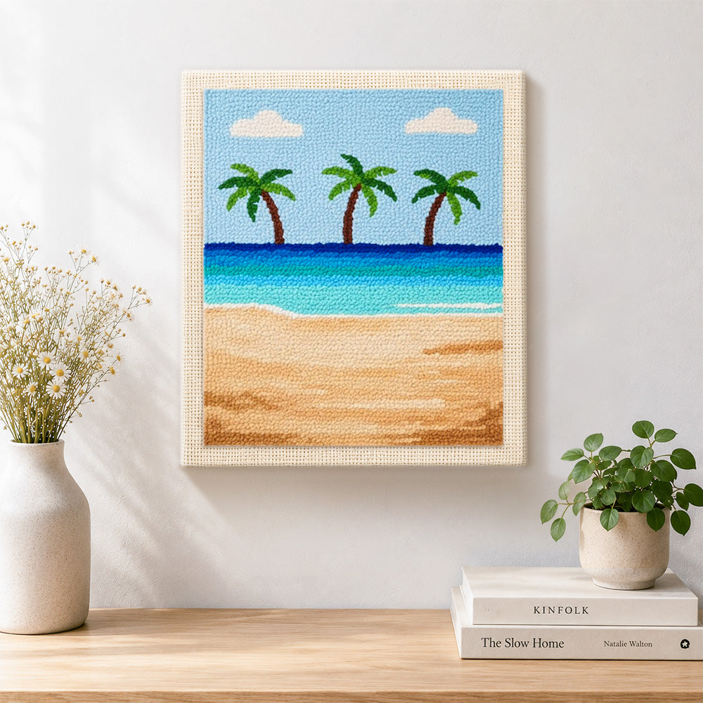 Finished three palm trees and blue ocean artwork displayed on a wall