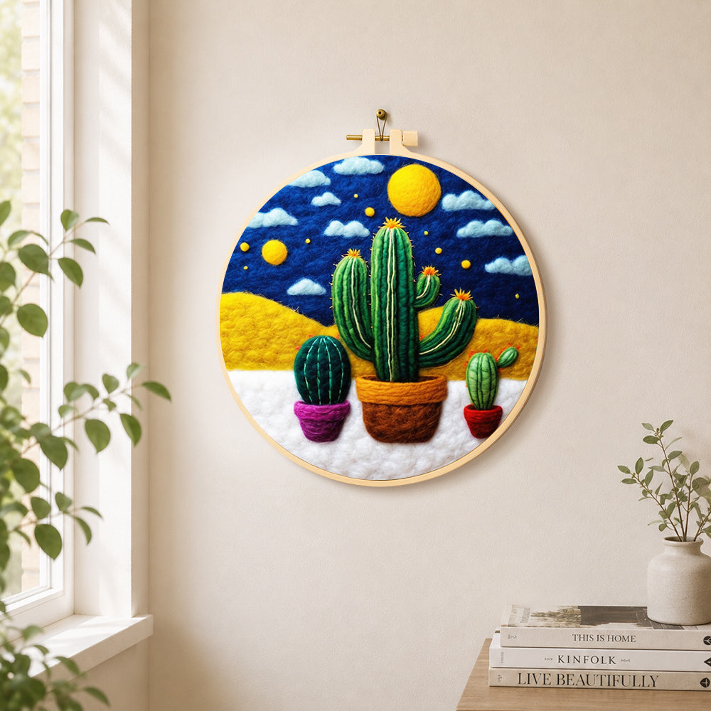 Three potted cactus under the starry night needle felt wall art displayed in a bright home interior