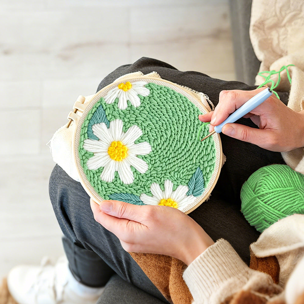 Creating handmade three pure white daisies punch needle artwork