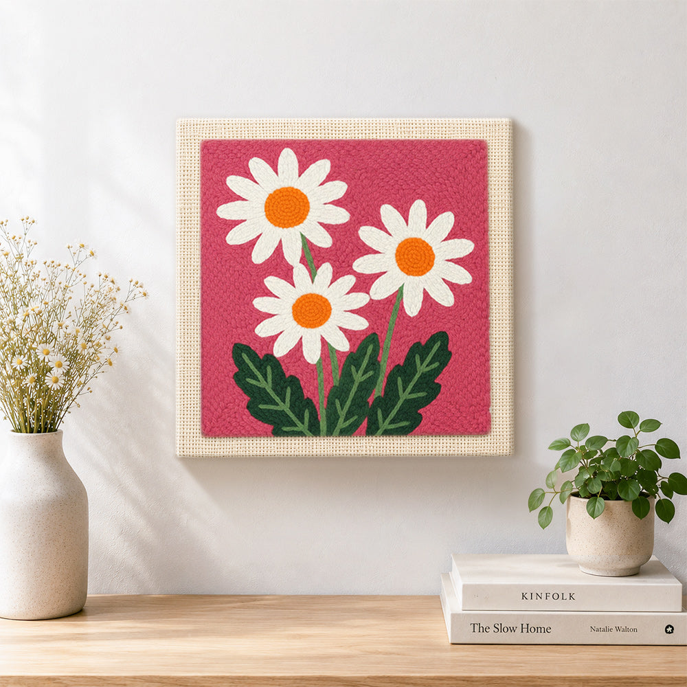 Finished three simple daisy flowers artwork displayed on a wall