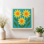 Finished three simple yellow sunflowers artwork displayed on a wall