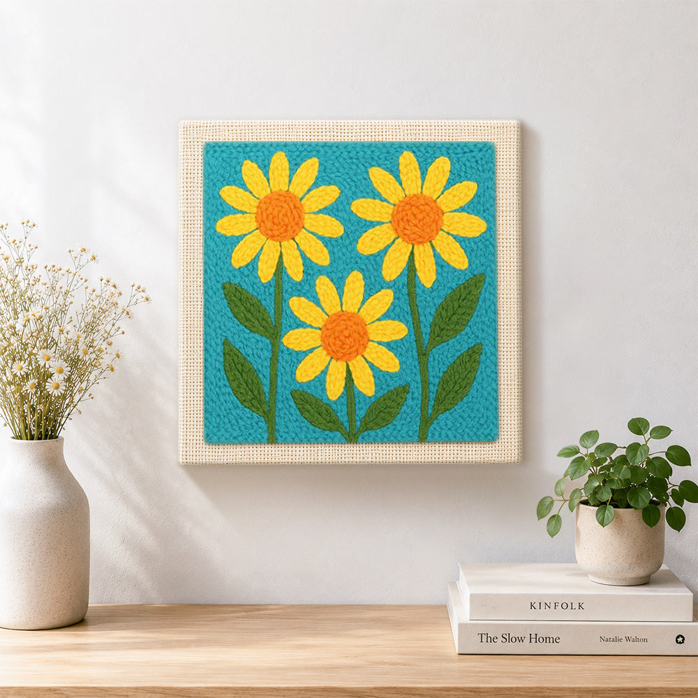 Finished three simple yellow sunflowers artwork displayed on a wall