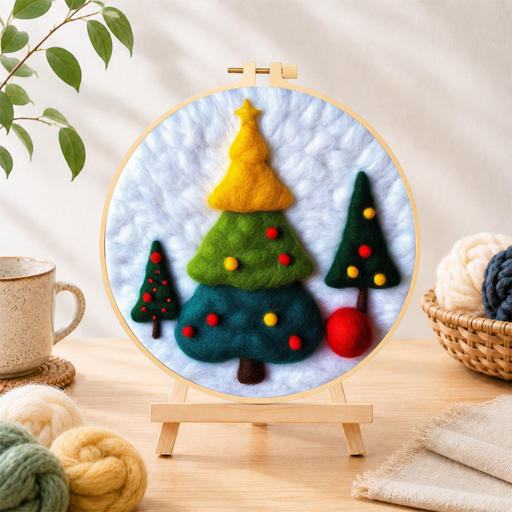 Finished three tiered christmas trees needle felting displayed on a wooden easel