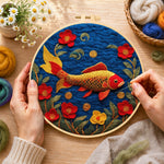 Creating the traditional koi fish and gorgeous flowers wool painting by hand with a felting needle