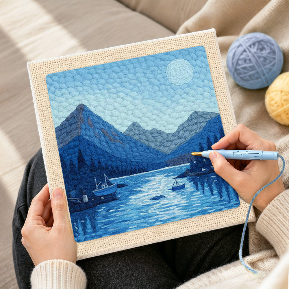 Creating handmade tranquil blue fjord and boats punch needle artwork