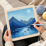 Creating handmade tranquil blue fjord and boats punch needle artwork