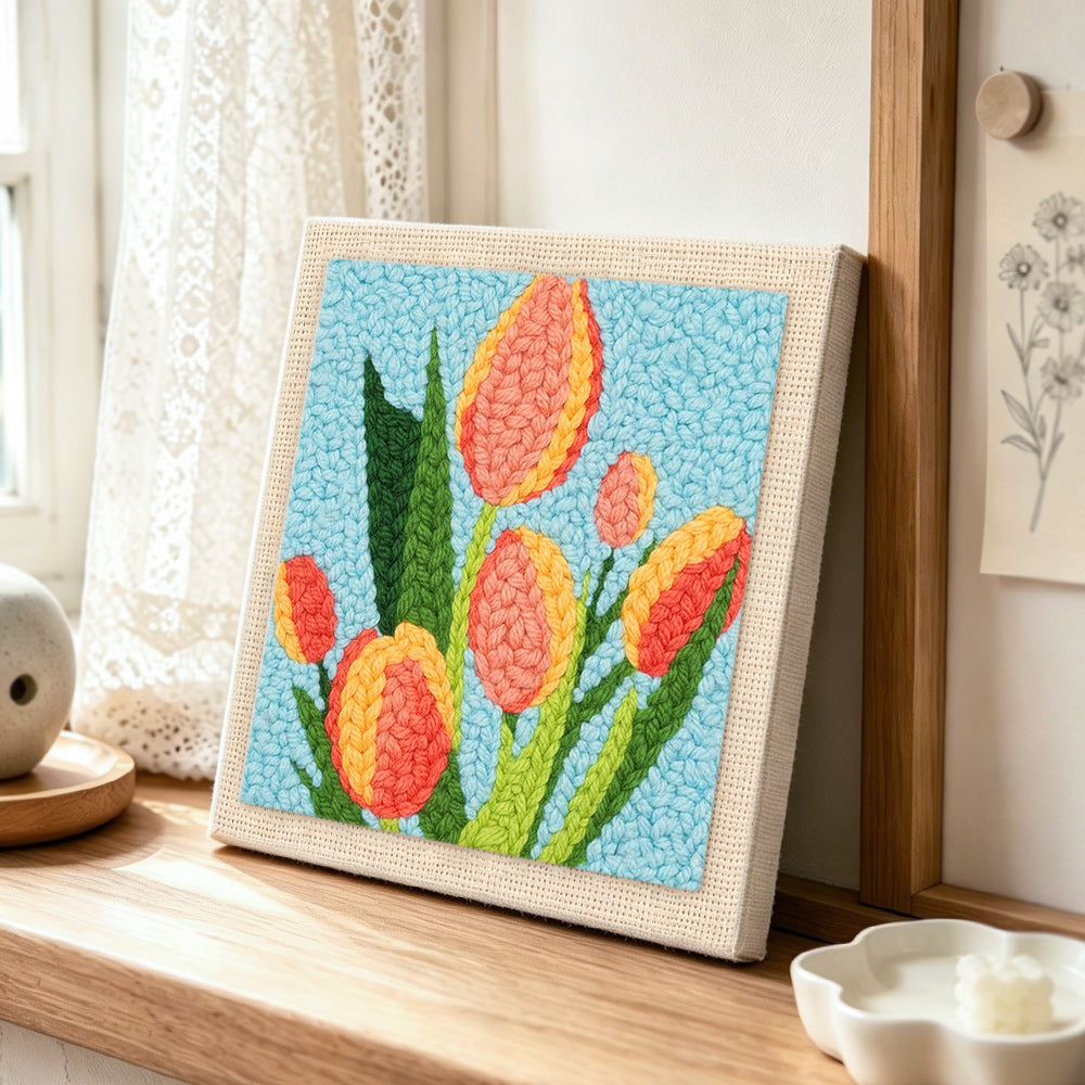 Tricolor tulips punch needle artwork displayed on a table