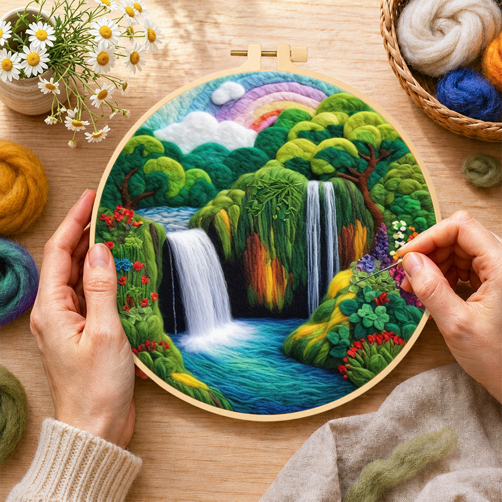Creating the tropical jungle scenery with lush waterfall wool painting by hand with a felting needle