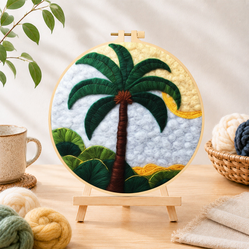 Finished tropical palm tree needle felting displayed on a wooden easel