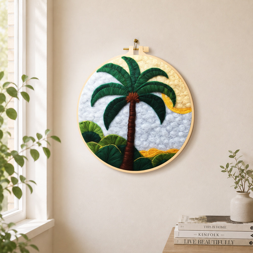 Tropical palm tree needle felt wall art displayed in a bright home interior