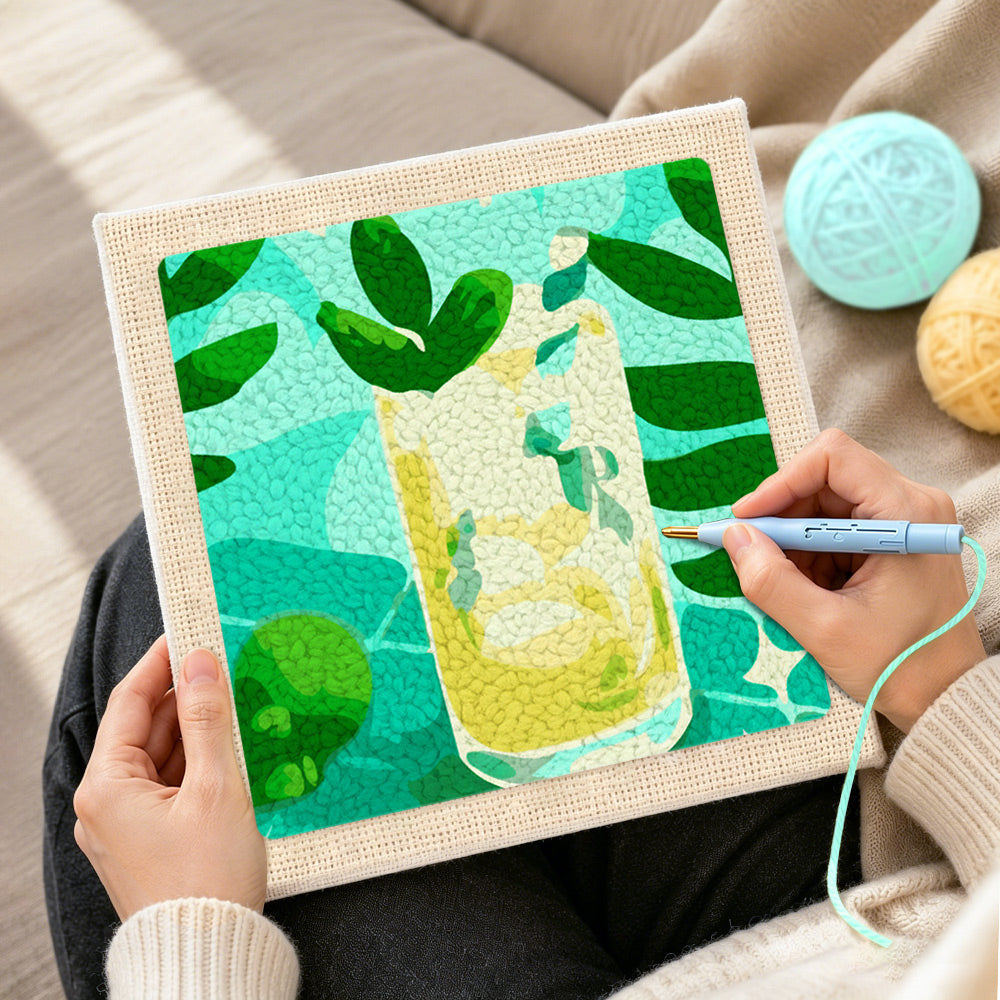 Creating handmade tropical refreshing cocktail punch needle artwork