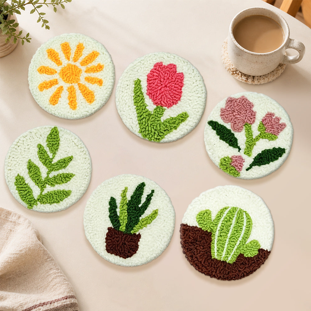 Tulip, cactus and sun punch needle coasters used for home decoration