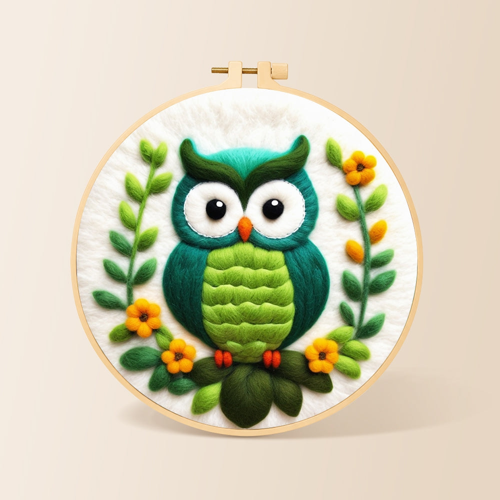 Turquoise owl needle felting kit for beginners with a round wooden frame