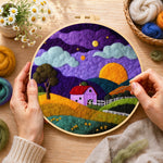 Creating the twilight purple farmhouse wool painting by hand with a felting needle